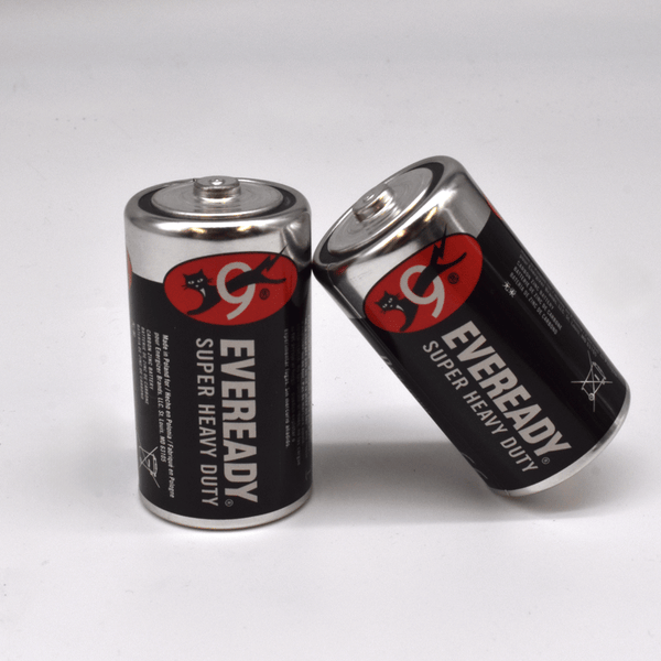 Two Eveready Super Heavy Duty batteries on a white background