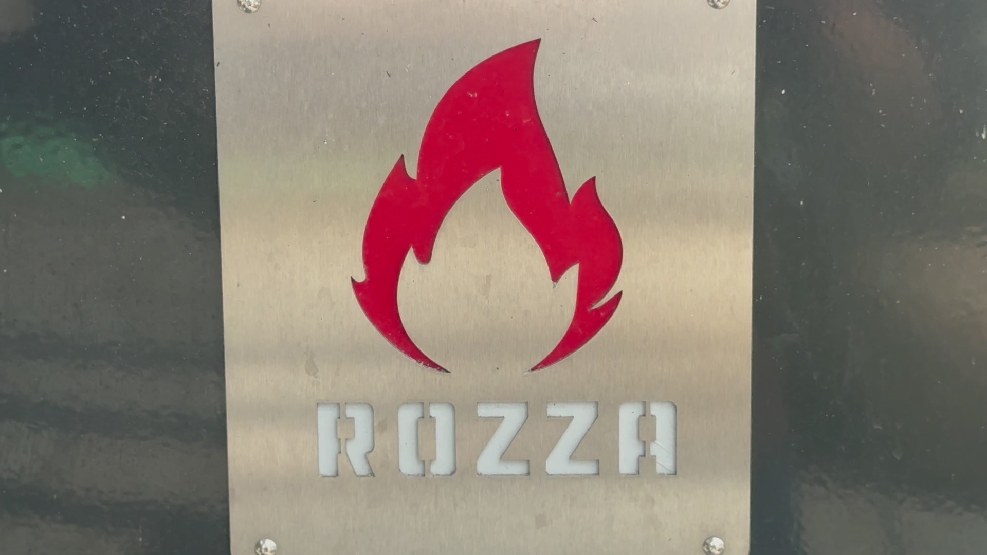 Rozza rotisserie used to cook saddleback BBQ potatoes and vegetarian medley