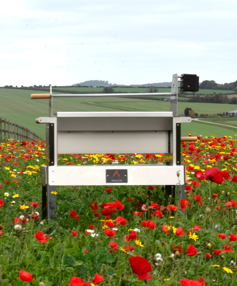 Rozza BBQ grill in field of poppies